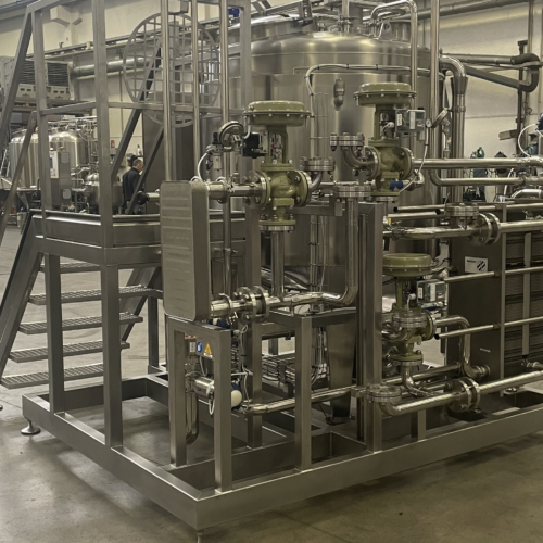 scambiatore di calore a piastre installato su impianto preparazione bagna al caffè